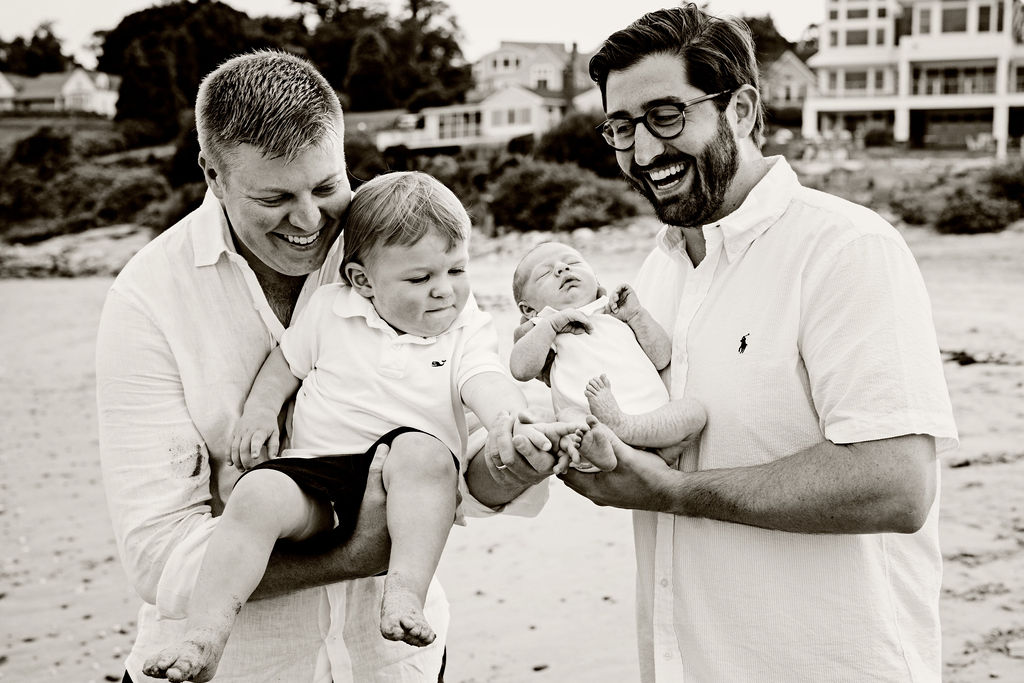 Fathers and sons at Bonnet Shores Beach Club for family portrait in Narragansett, RI