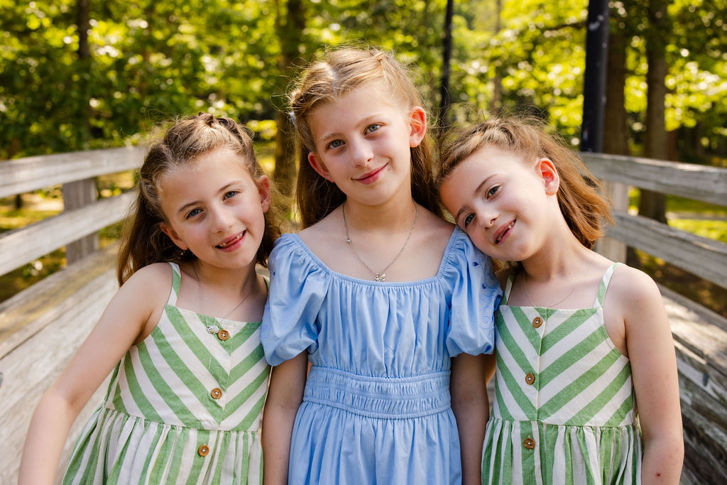 Kids on the foot bridge at Goddard Park in East Greenwich during their extended family photo session