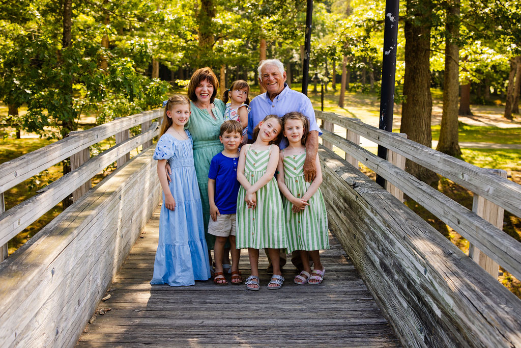 Kids and Grandparents on the foot bridge at Goddard Park in East Greenwich during their extended family photo session